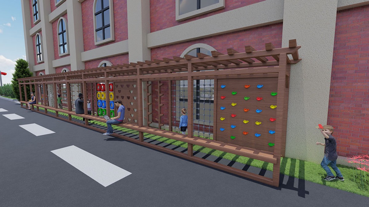 Многофункциональная площадка для скалолазания, интегрированная в коридор детского сада